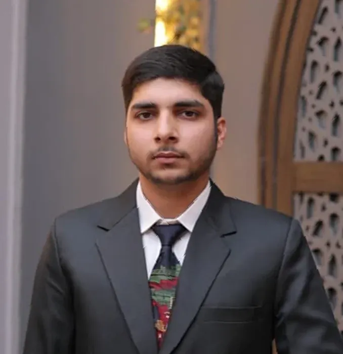 Portrait of Saif Kasbati, graphic designer and web developer in Karachi